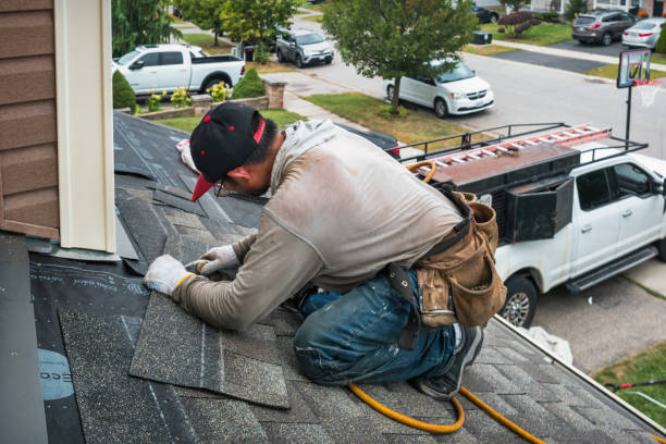 Professional Roofing technician working in SUNY Oswego, NY
